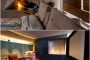 dormitorio y sala cine Desert Courtyard House