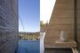 muro tierra apisonada piscina Residencia Redding