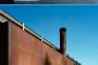 sala con chimenea H-House