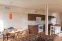 Upcycle Living, vista de la sala de abajo