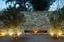 muro de piedra con chimenea, Corten House
