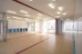 interior Centro inmigrantes contenedores aula