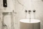 mármol baño apartamento Varsovia