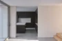 cocina desde comedor escalones y celosia